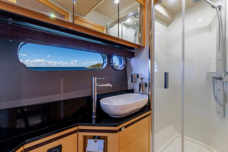 Bathroom with shower and basin on a Sunseeker yacht