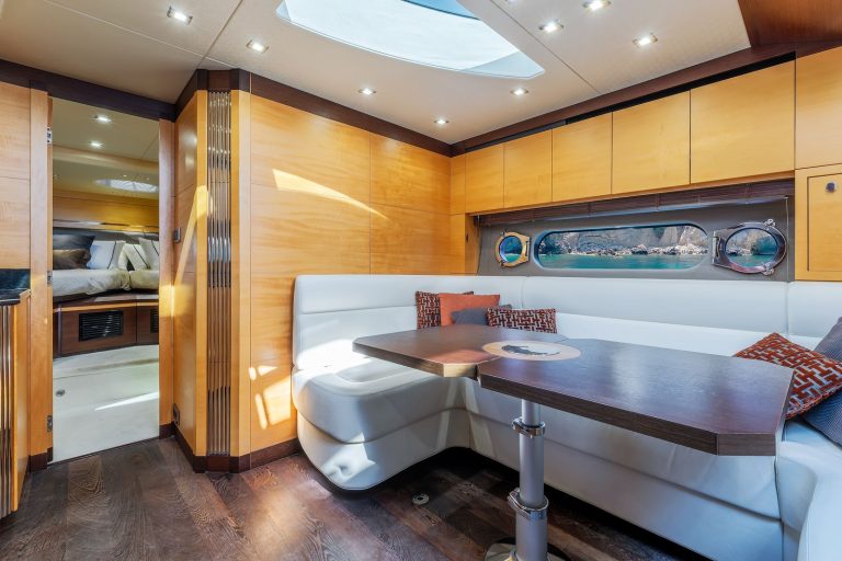 Saloon dinette with leather seating on a Sunseeker yacht