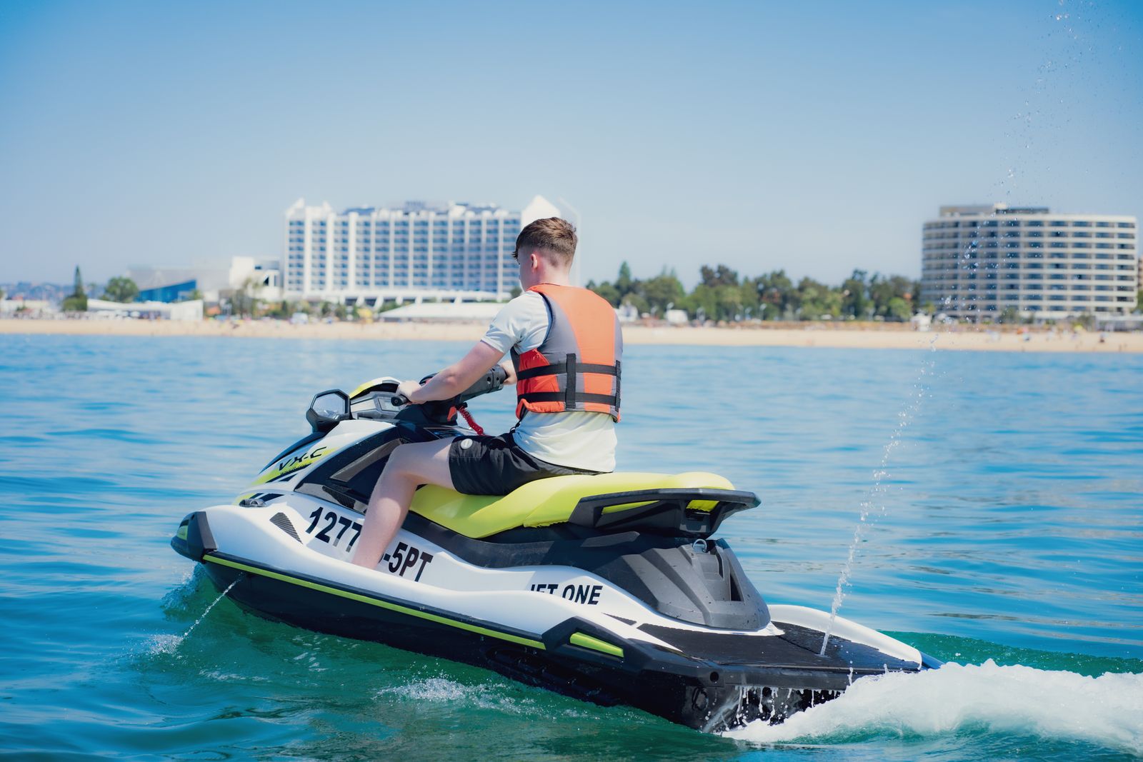 Jet ski rider in front of the Tivoli Marina Vilamoura hotel