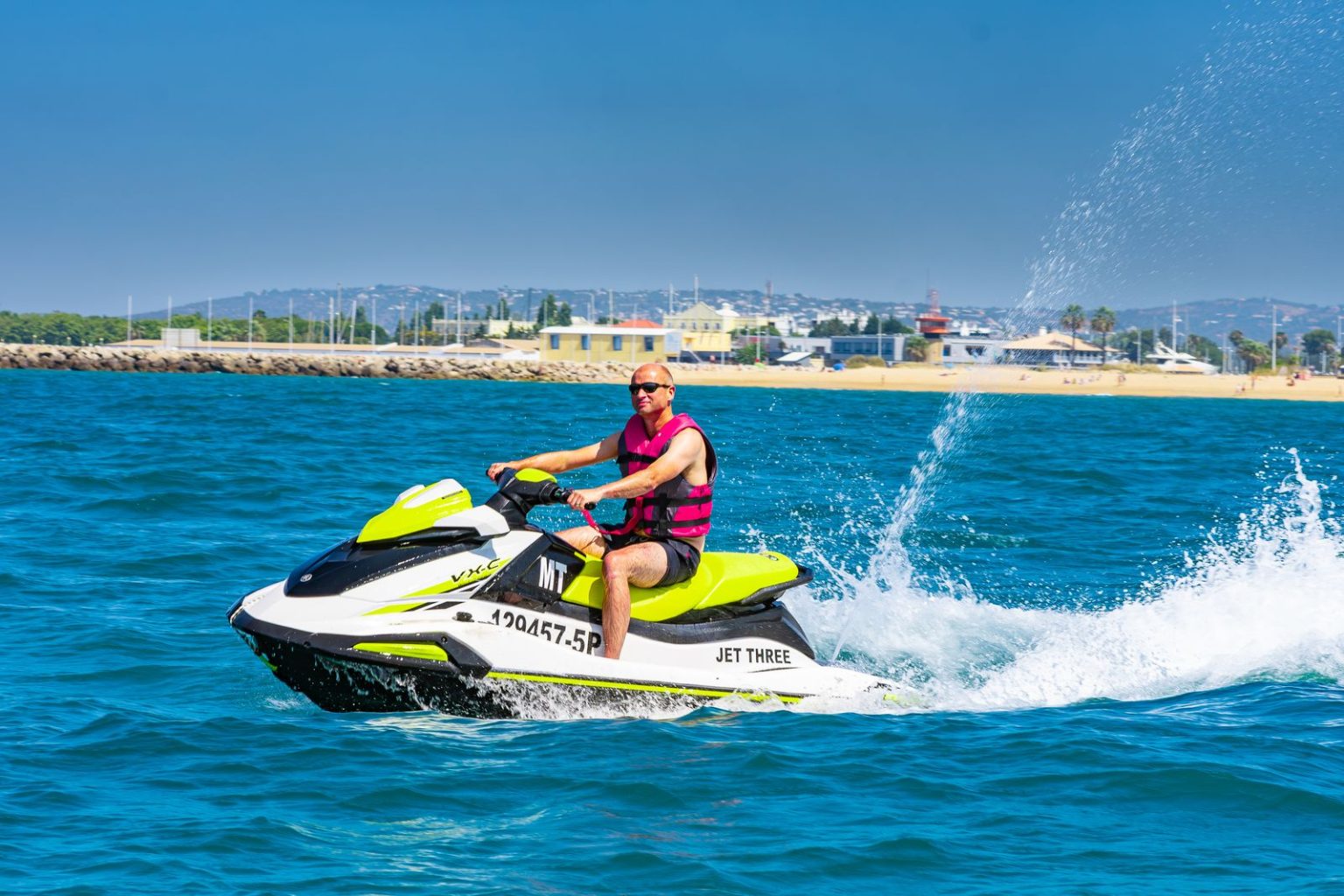 Rider on a jet ski in front of Vilamoura beach