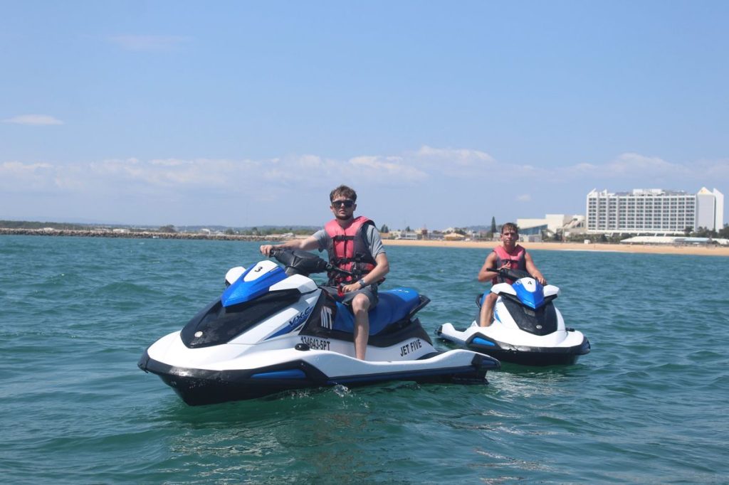 Two riders on jet skis near Vilamoura Marina