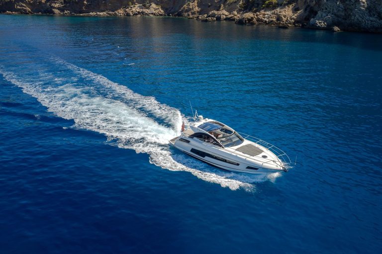 Sunseeker San Remo 53 yacht NOON cruising at speed across deep blue sea
